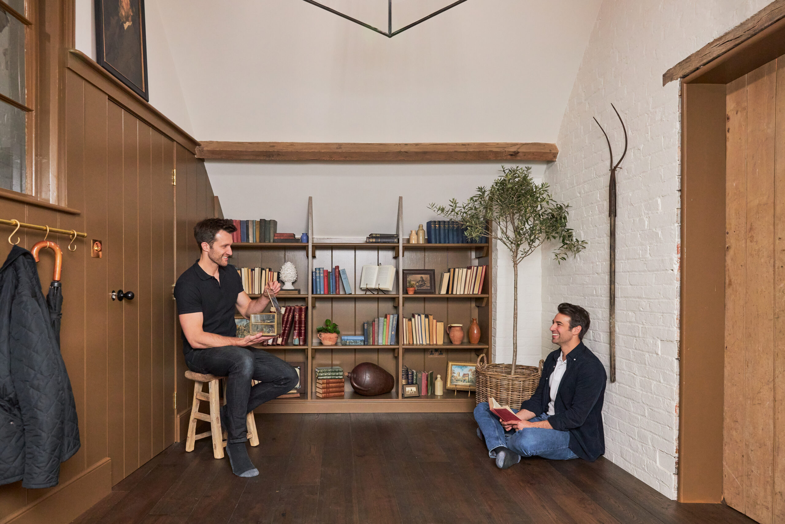 As seen on Saving the Manor homeowners Dean and Borja react to seeing their restored hay loft bedroom and bathroom. Their hay loft bedroom with new divding doors, roof window, oak flooring with underfloor heating and wood paneling.